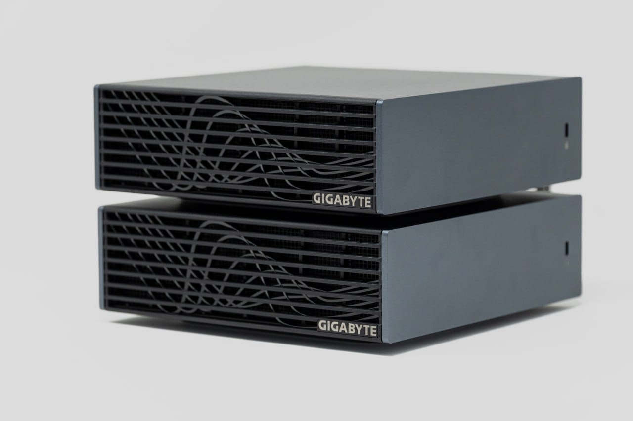 Two GIGABYTE AI TOP ATOM systems stacked in a compact two-node arrangement