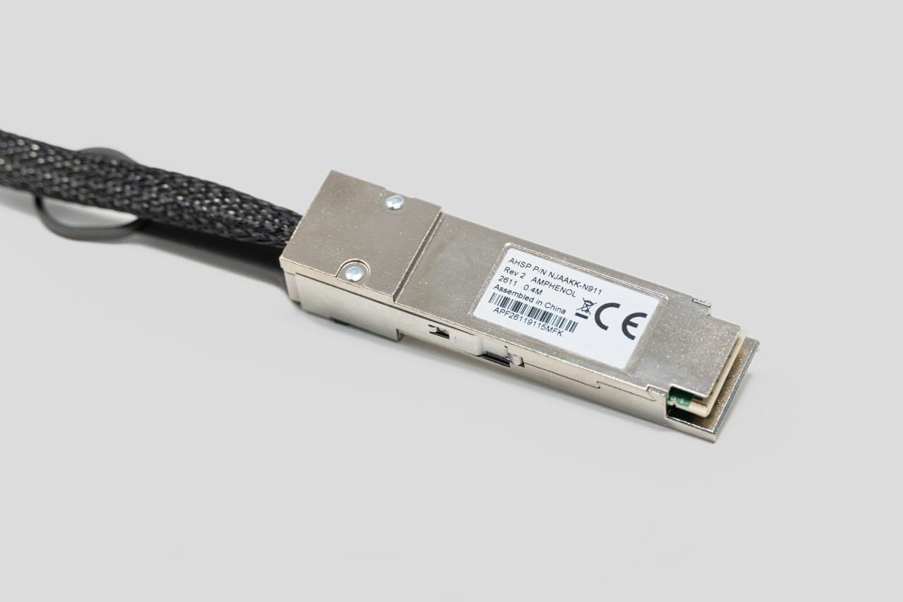 Close-up of the Amphenol direct-attach cable connector used with the AI TOP ATOM systems