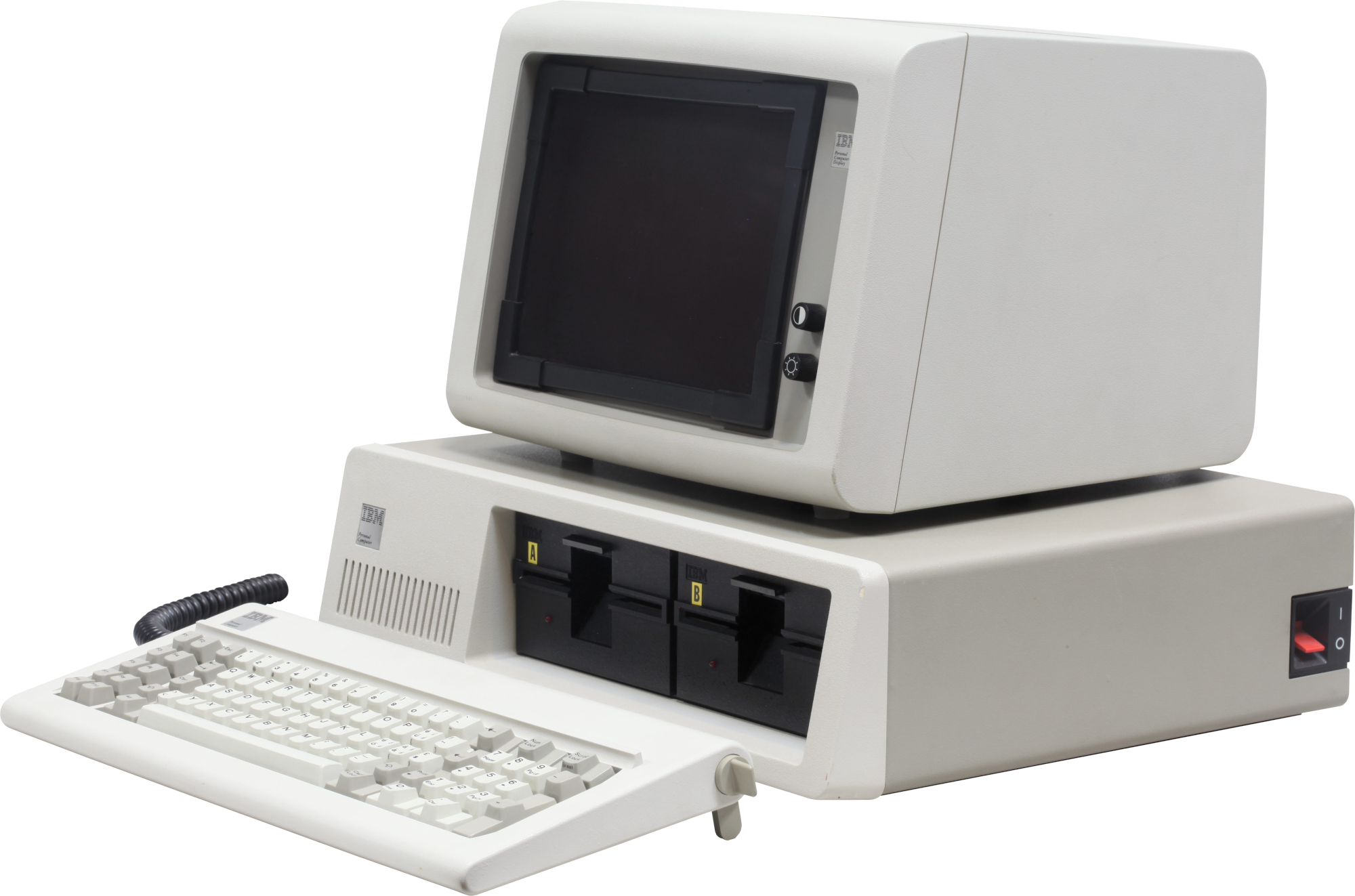 The original 1981 IBM Personal Computer: a beige CRT monitor on top of the system unit, with two floppy drives and a coiled-cable keyboard